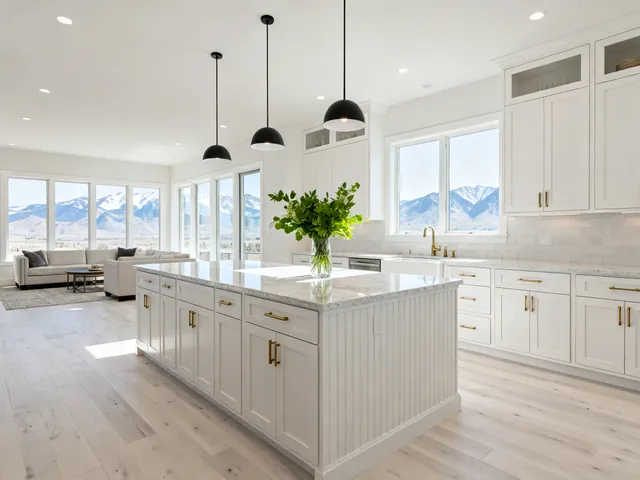 A bright, modern kitchen with mountain views